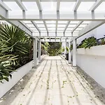 Estoril Contemporary Garden Villa By Cadenzalux